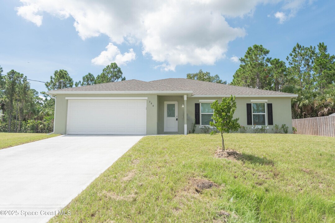 390 J T Sancho St SW in Palm Bay, FL - Building Photo