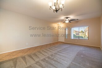 14647 W Gelding Dr in Surprise, AZ - Building Photo - Building Photo