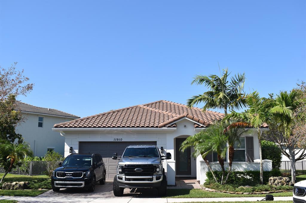11910 NW 83rd Pl in Parkland, FL - Building Photo