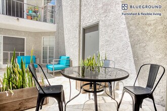 8560 W Olympic Blvd-Unit -FL1-ID1117 in Los Angeles, CA - Building Photo - Building Photo