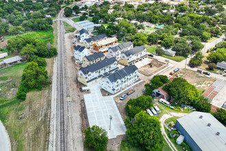 Purple Rail - Townhomes Priced by the Room in Stephenville, TX - Building Photo - Building Photo