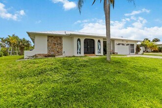 18606 Briggs Cir in Port Charlotte, FL - Building Photo - Building Photo