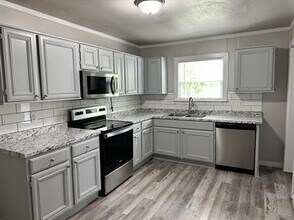 1409 Wolfe City Dr in Greenville, TX - Building Photo - Building Photo