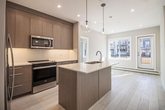 6 Merganser Dr W in Chestermere, AB - Building Photo - Building Photo