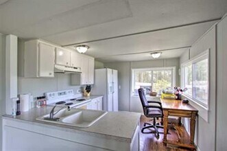 8417 Penny Ln in Anderson Island, WA - Building Photo - Building Photo