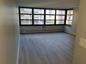 33 E Cedar St, Unit 8H in Chicago, IL - Foto de edificio - Building Photo