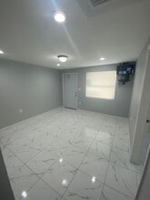 545 SW 10th St, Unit #1 in Belle Glade, FL - Foto de edificio - Building Photo
