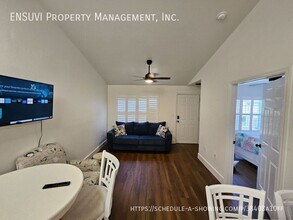 9588 Lake Chase Island Way in Tampa, FL - Foto de edificio - Building Photo