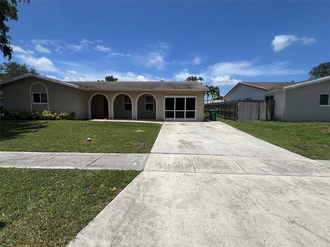 property at 7975 NW 8th St