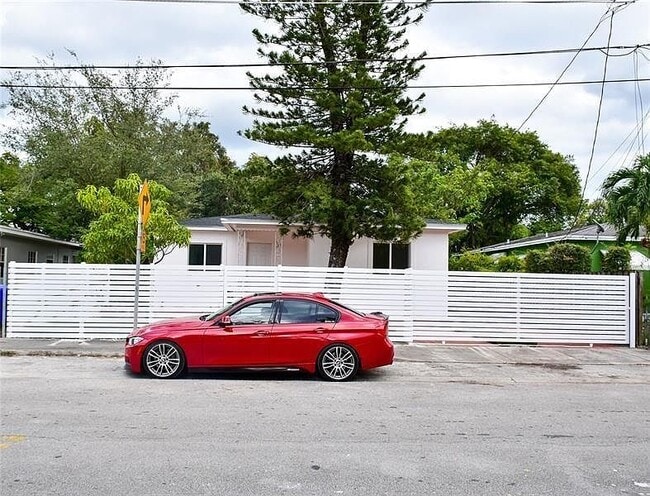 property at 5715 NW 6th Ave