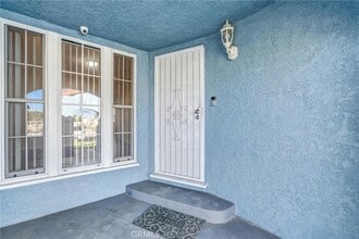 9807 S Denker Ave in Los Angeles, CA - Building Photo - Building Photo