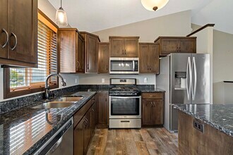 7713 Lambert Cir NE in Otsego, MN - Foto de edificio - Building Photo