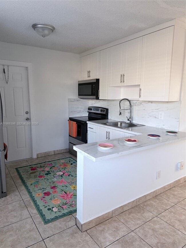 4658 Myla Ln in West Palm Beach, FL - Building Photo - Building Photo