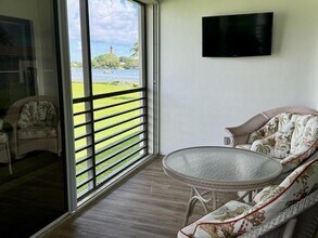 755 Saturn St, Unit E201 in Jupiter, FL - Building Photo - Building Photo