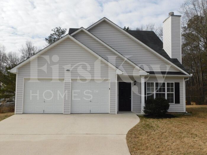 3901 Doe Run Dr in Powder Springs, GA - Foto de edificio