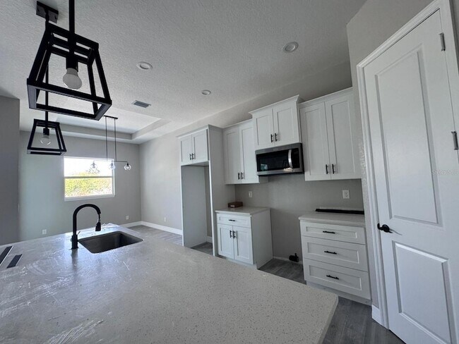 128 Blue Rd in Rotonda West, FL - Building Photo - Building Photo