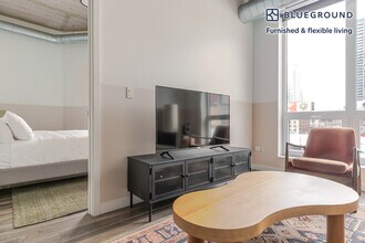 61 W Erie St, Unit SI FL4-ID1410 in Chicago, IL - Building Photo - Building Photo