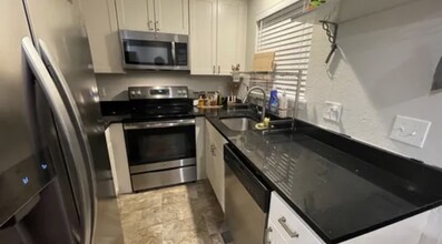 909 S Dawson Way, Unit Unit1 in Aurora, CO - Foto de edificio - Building Photo