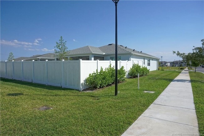 property at 14143 SW Safi Ter