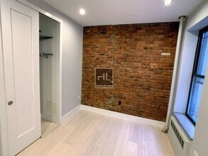 STANTON ST., Unit 5E1 in New York, NY - Foto de edificio - Building Photo