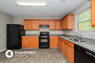 6034 Waggoner Ct in Rex, GA - Foto de edificio - Building Photo