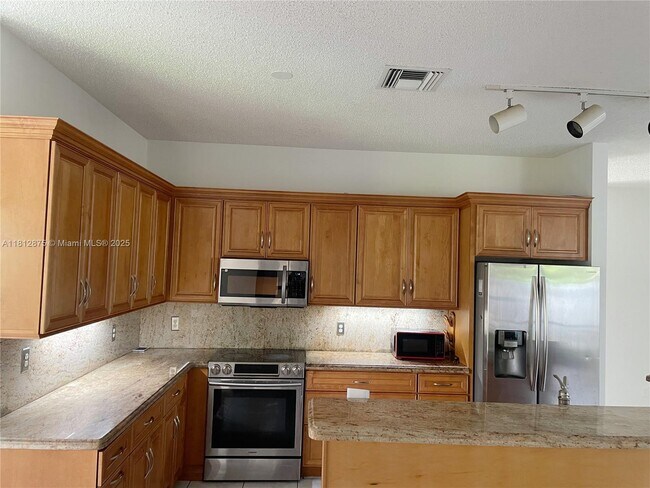 15840 NW 16th Ct in Pembroke Pines, FL - Building Photo - Building Photo