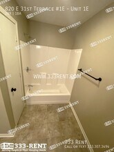 820 E 31 Terrace, Unit Unit 1E in Kansas City, MO - Building Photo - Building Photo