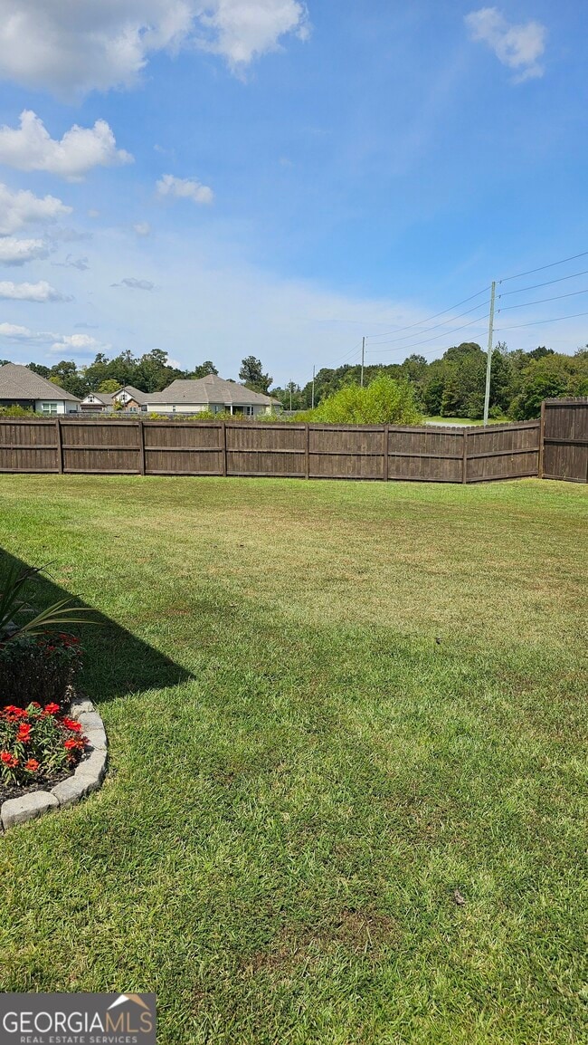 208 Huxley Ter in Bonaire, GA - Building Photo - Building Photo
