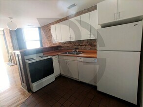 604 W Surf St, Unit 602-3 in Chicago, IL - Building Photo - Building Photo