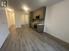 7439 Kingston Rd in Toronto, ON - Building Photo - Building Photo