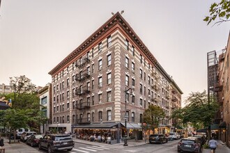 39 Downing St in New York, NY - Building Photo - Primary Photo