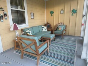 8816 Attitude Ave in Panama City Beach, FL - Foto de edificio - Building Photo