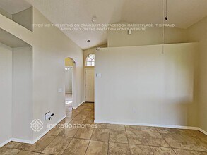 1403 Belvoir Dr in Davenport, FL - Foto de edificio - Building Photo