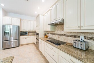 7655 Martino Cir in Naples, FL - Building Photo - Building Photo