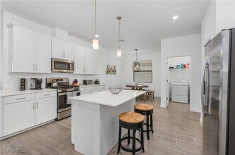 20210 KIngmont Dr in Estero, FL - Building Photo - Building Photo