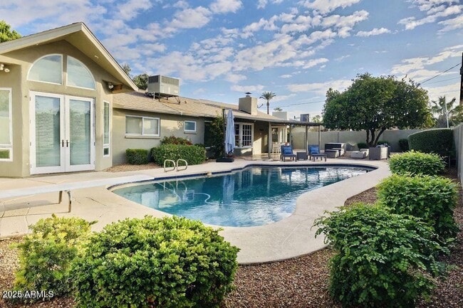property at 8555 E Roma Ave