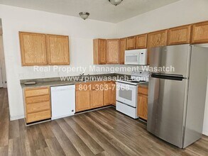 2401 Big Village Ct in West Valley City, UT - Building Photo - Building Photo