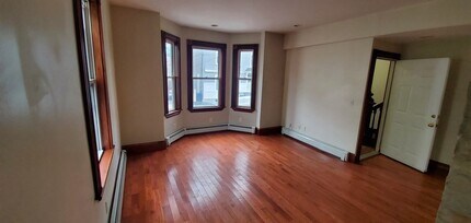 69 Mozart St, Unit 1 in Boston, MA - Building Photo - Building Photo