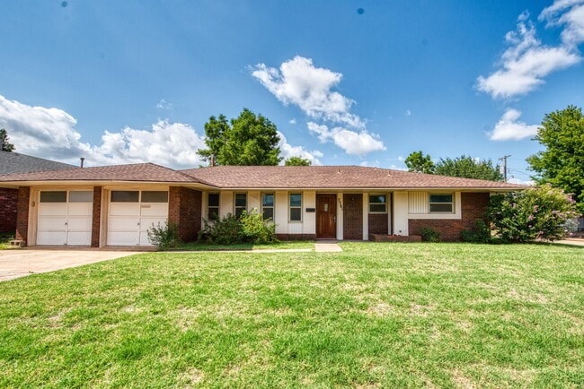 property at 7701 NW 24th St