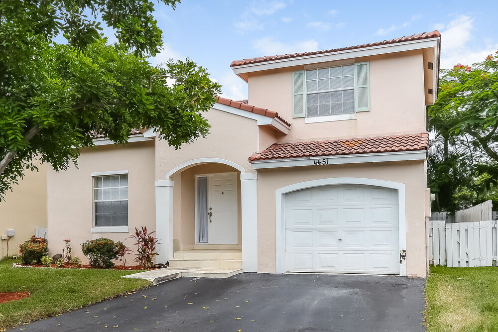 4451 NW 61st Pl in Coconut Creek, FL - Building Photo