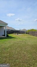 208 Huxley Ter in Bonaire, GA - Building Photo - Building Photo
