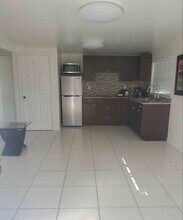 7721 W Hiawatha St in Tampa, FL - Foto de edificio - Building Photo