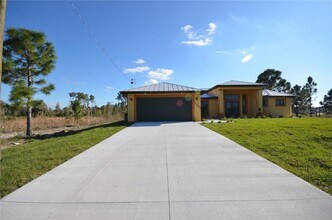 1242 Hathor St E in Lehigh Acres, FL - Building Photo - Building Photo