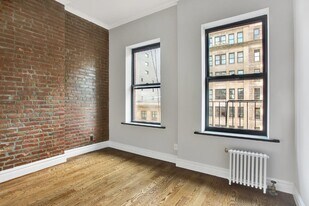219 E 23rd St, Unit 12 in New York, NY - Building Photo