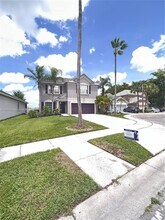 5708 S Plum Bay Pkwy in Tamarac, FL - Building Photo - Building Photo
