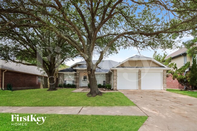 property at 18811 Singing Woods Dr