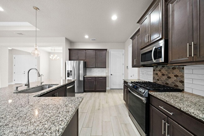 4455 Negal Cir in Melbourne, FL - Foto de edificio - Building Photo