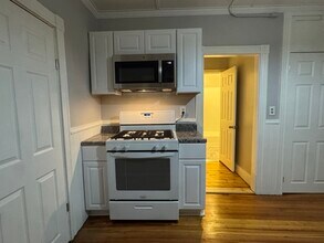 58 Division St, Unit 1 in Manville, RI - Building Photo - Building Photo