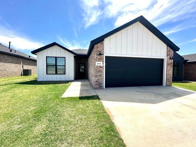 property at 611 E 14th St