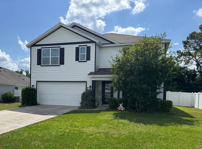 property at 890 NW 253 Dr